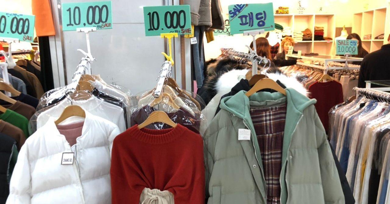 Clothing store offering sales in the vibrant underground shopping street of Yeongdeungpo, Seoul.